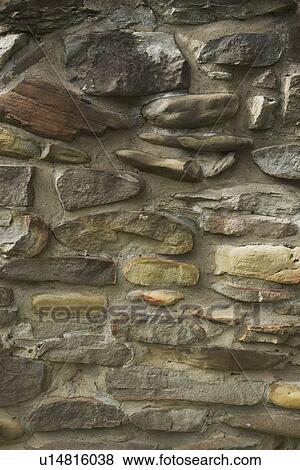 Stock Photo - alberta, canada; a rock wall. Fotosearch