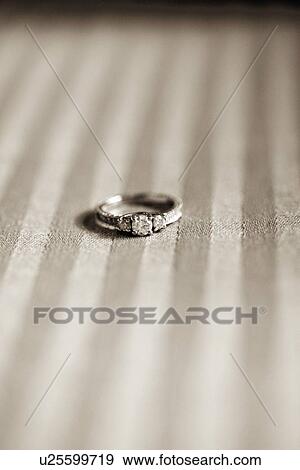 Stock Photo - an engagement ring. Fotosearch