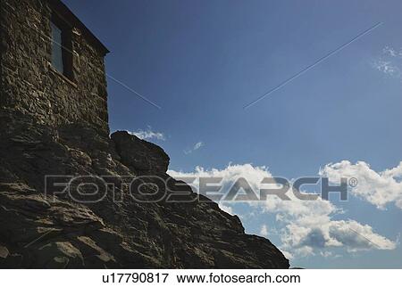Stock Photo - banff, alberta, canada; a rock building on a mountain. Fotosearch