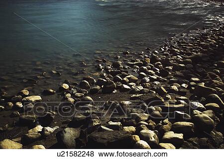 banff, alberta, canada; rocks on the shoreline View Large Photo Image Stock Photo - banff, alberta, canada; rocks on the shoreline. Fotosearch