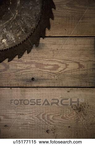 Stock Photography - camrose, alberta, canada; the blade of an old saw. Fotosearch
