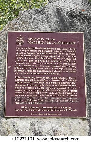 Stock Image - dawson city, yukon territory, canada; a discovery claim plaque of the klondike gold rush along chilkoot trail in chilkoot pass. Fotosearch
