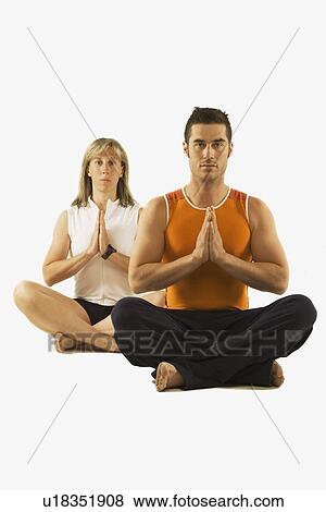 man and woman in a yoga pose View Large Photo Image Stock Photo - man and woman in a yoga pose. Fotosearch