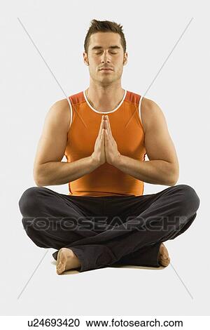man in a yoga pose View Large Photo Image Stock Image - man in a yoga pose. Fotosearch