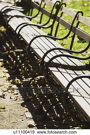Stock Photo - new york, new york, united states of america; a park bench. Fotosearch