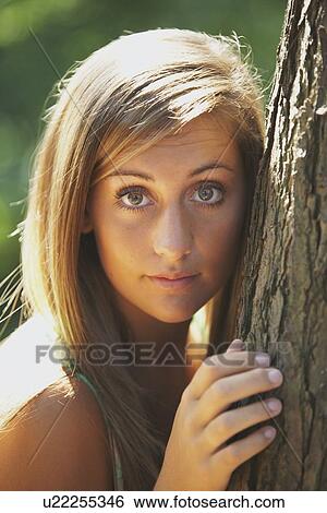 portrait of a young woman View Large Photo Image Stock Photograph - portrait of a young woman. Fotosearch