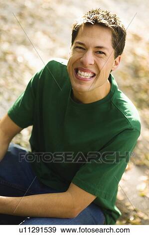 willmar, minnesota, united states of america; a young man with a big smile View Large Photo Image Stock Photo - willmar, minnesota, united states of america; a young man with a big smile. Fotosearch