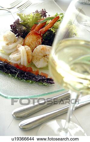 Picture - A dish of lobster, scampi and salad. Fotosearch