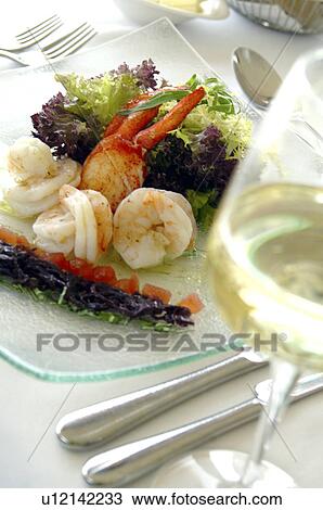 Stock Image - A dish of lobster, scampi and salad. Fotosearch