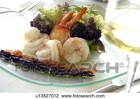 Stock Image - A dish of lobster, scampi and salad. Fotosearch