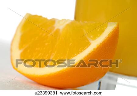 Stock Image - A glass of orange juice. Fotosearch