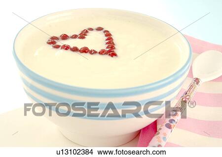 A heart made of red currants in a bowl with yoghurt View Large Photo Image Picture - A heart made of red currants in a bowl with yoghurt. Fotosearch
