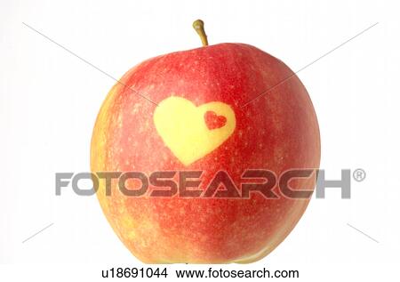 Apple with a heart pattern View Large Photo Image Picture - Apple with a heart pattern. Fotosearch