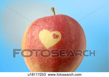 Apple with a heart pattern View Large Photo Image Stock Image - Apple with a heart pattern. Fotosearch
