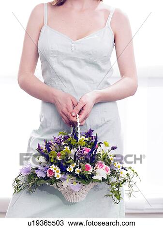 Stock Image - Arrangement of roses, sweet pea, columbine and veronica. Fotosearch