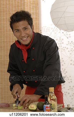 Asian chef preparing food View Large Photo Image Stock Image - Asian chef preparing food. Fotosearch