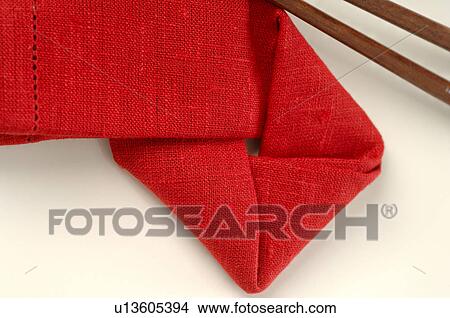 Asian place setting with a red napkin and chopsticks View Large Photo Image Picture - Asian place setting with a red napkin and chopsticks. Fotosearch