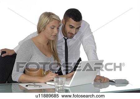 At work with lapto View Large Photo Image Stock Photography - At work with lapto. Fotosearch