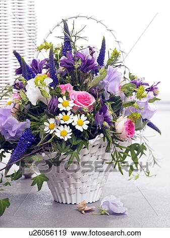 Basket with roses, vetches, veronica, chamomille and columbines View Large Photo Image Stock Photo - Basket with roses, vetches, veronica, chamomille and columbines. Fotosearch