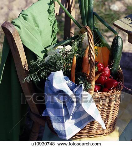 Stock Photo - Basket with vegetables. Fotosearch