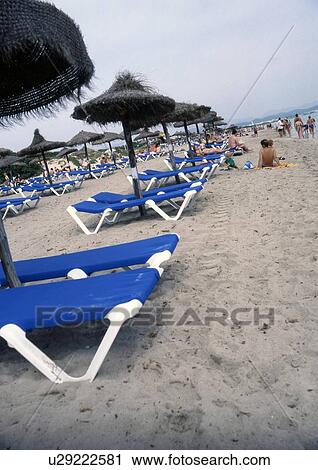 Beach with sun loungers View Large Photo Image Stock Image - Beach with sun loungers. Fotosearch