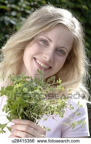 Stock Photograph - Beauty prescriptions with herbs. Fotosearch