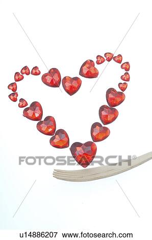 Stock Photo - Big red heart made of little hearts. Fotosearch