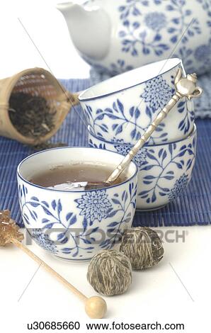 Stock Image - Blue-white asian tea set. Fotosearch