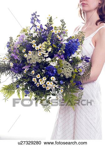 Stock Image - Bouquet of larkspur, vetch, camomile, phlox and fern. Fotosearch