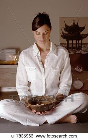 Stock Image - Bowl with fragrance candles. Fotosearch