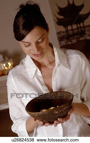 Stock Photo - Bowl with fragrance candles. Fotosearch