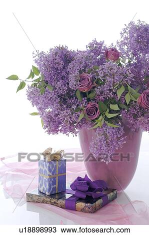 Bunch of lilacs and gifts View Large Photo Image Stock Image - Bunch of lilacs and gifts. Fotosearch