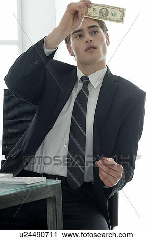 Businessman with banknote View Large Photo Image Stock Image - Businessman with banknote. Fotosearch