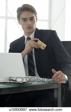 Businessman with credit card View Large Photo Image Stock Photo - Businessman with credit card. Fotosearch
