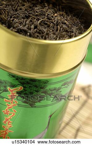 Picture - Can filled with loose tea. Fotosearch