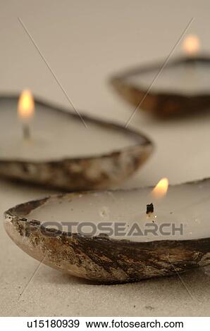 Stock Photo - Candle in seashell. Fotosearch