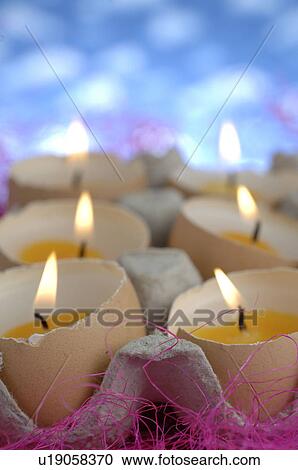 Stock Image - Candles in egg form. Fotosearch