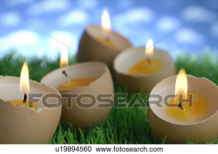 Stock Image - Candles in egg form. Fotosearch