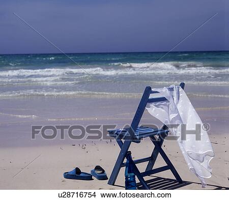 Picture - chair on the beach. Fotosearch