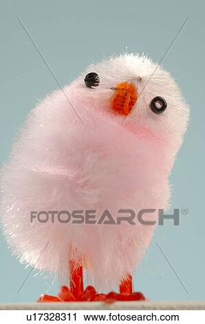Stock Image - CLose-up white decorative chicken. Fotosearch