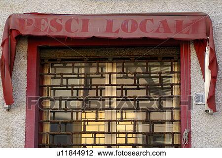 Stock Image - Closed seafood restaurant. Fotosearch