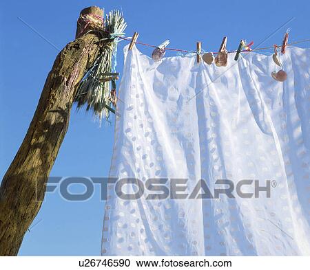 Clothesline with white curtain View Large Photo Image Stock Image - Clothesline with white curtain. Fotosearch