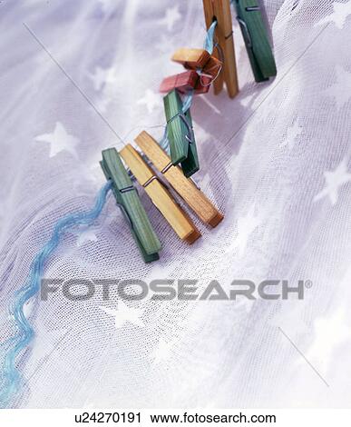 Stock Image - clothespin with tulle. Fotosearch