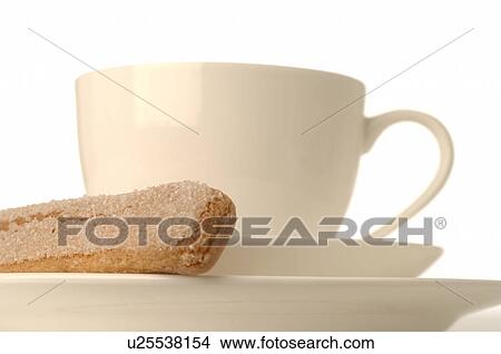 Picture - Coffee cup with a biscuit. Fotosearch