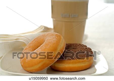 Coffee with milk with doughnuts View Large Photo Image Stock Image - Coffee with milk with doughnuts. Fotosearch