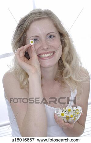 Cosmetic with flowers View Large Photo Image Stock Photo - Cosmetic with flowers. Fotosearch