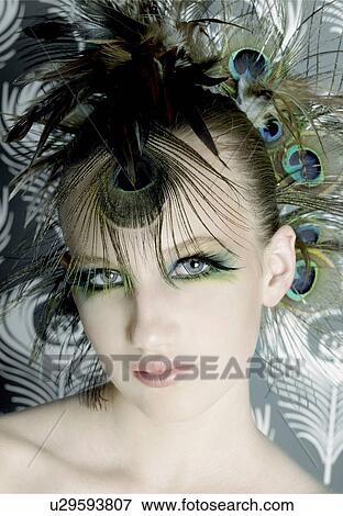 Stock Photo - Decoration with peacock feathers. Fotosearch