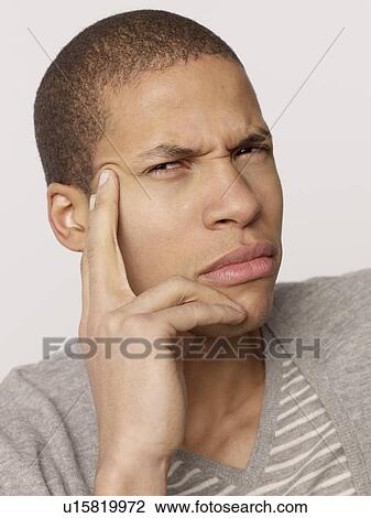 Stock Image - Discontent man. Fotosearch