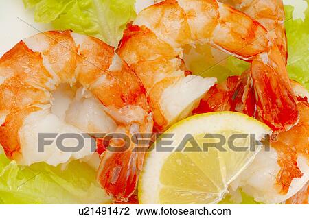 Dish of shrimps, lemon and salad View Large Photo Image Stock Image - Dish of shrimps, lemon and salad. Fotosearch