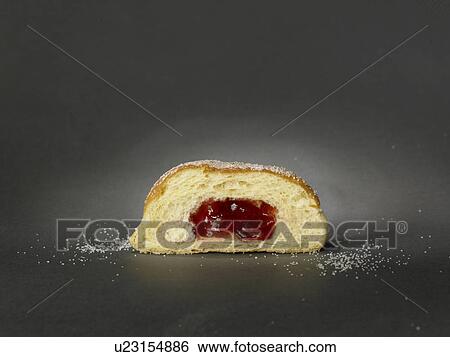 Stock Photograph - Doughnut with powdered sugar. Fotosearch